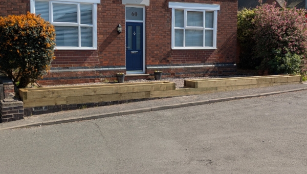 Sleeper raised bed planters
